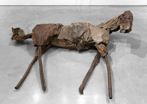 When a horse lies down, it is because it feels safe, which, for Deborah Butterfield, is a way of saying that it is okay to make ourselves vulnerable. "Echo", constructed in ways that respect her foraging skills and ability to weld metalwork, does not adhere to a traditional portrayal of a horse but instead reveals something of its essential nature. Constructed from pieced-together steel sheets, some rippled, others folded or crimped, it is a piece that bears the mark of time, aged to a rust-brown patina, imperfections celebrated rather than concealed. Butterfield's deliberate choice of materials and their treatment adds depth and character, transforming Untitled, Echo into more than just an equine representation — it reflects the rugged beauty and the resilience of the animal it represents.