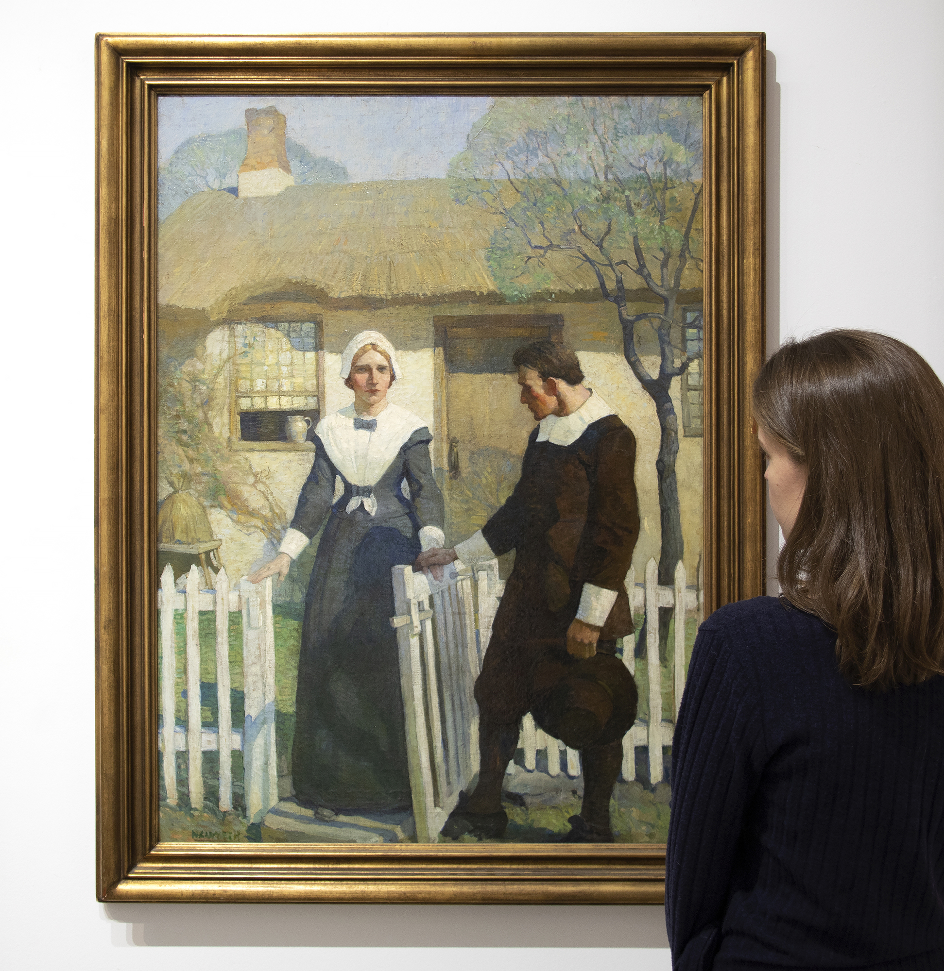 N.C. WYETH - "Good-bye, Mistress Friendly-Soul!" Initially used as a frontispiece illustration for the 1914 novel, “The Witch,” by Mary Johnston, Wyeth’s painting presents a poignant scene of friendship and understanding between a grieving, independent woman and a generous, misunderstood doctor. Although the two hardly know each other, they have a shared understanding of and reverence for what is good. While the rest of the town searches for the devil in all things, these two choose kindness and light. Here, they take a moment to appreciate the lives they have led and the good they have done. Wyeth’s illustration depicts hope and expectation of good despite the perils and sorrows of human life.
<br>
<br>In addition to illustrating more than 100 books, including adventure classics like Treasure Island, Kidnapped, Robinson Crusoe, and The Last of the Mohicans, Wyeth was also a highly regarded muralist, receiving numerous commissions for prestigious corporate and government buildings throughout the United States. Wyeth’s style, honed by early work at the Saturday Evening Post and Scribner’s, demonstrates his keen awareness of the revealing gesture, allowing readers to instantly grasp the essence of a scene.