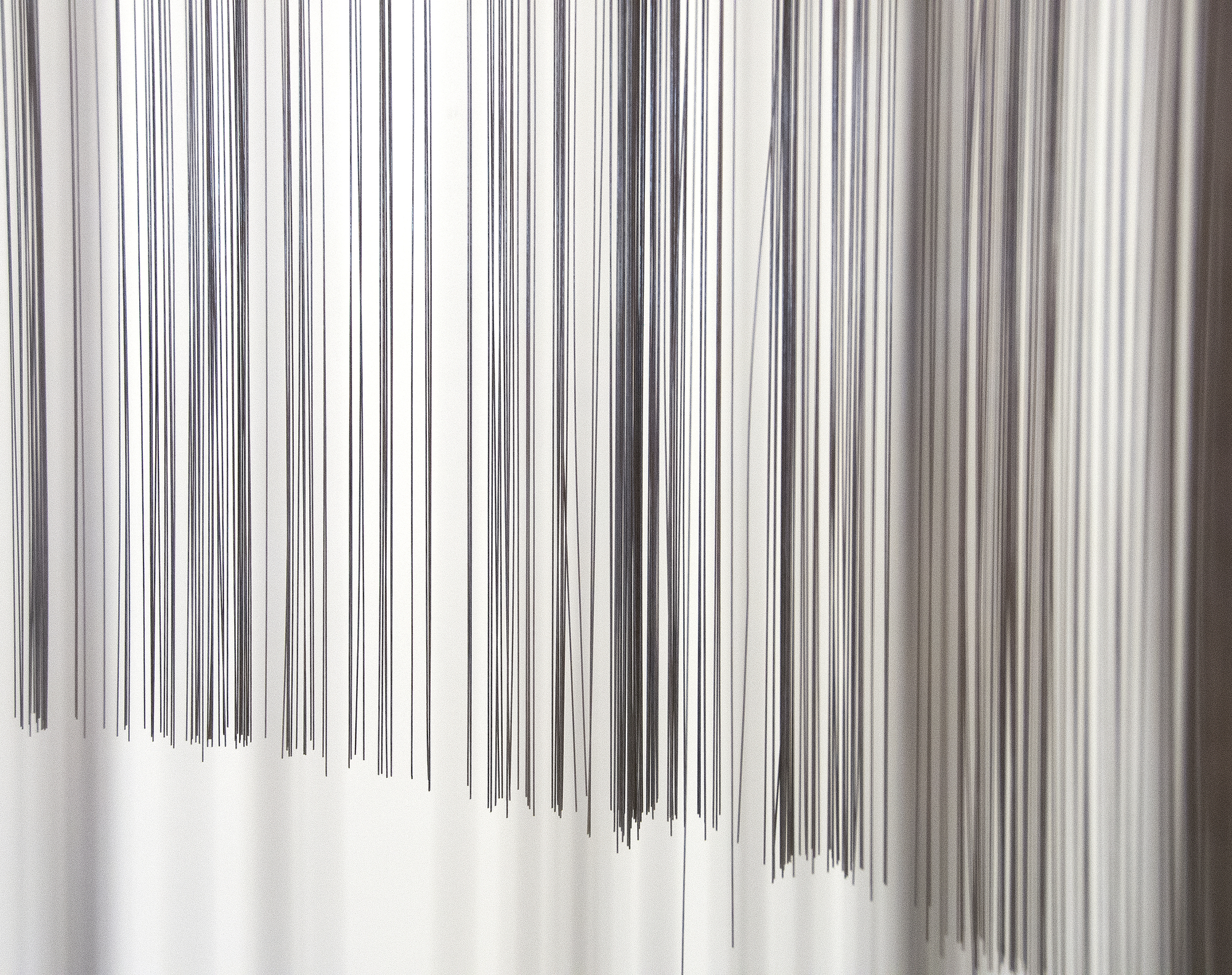 HARRY BERTOIA - Untitled (Suspended Willow) Harry Bertoia’s Willow sculpture resonates as an expression of grace and delicacy; qualities that bely the usual associations we have with the intrinsic properties of the alloy of which it is made. This suspended version – the rare version of Willow - seems to have a self-aware presence; one that delights in that contrast of properties. Yet it invites nothing more than existential pleasure in the viewing of it. Think of Willow as a boldly articulated version of Calder if the latter master had a more organic or corporeal evocation in mind. Suspended, it commands its area yet respects its spatial relationship to its surround. Light, form, space – these are conceptual tools of the sculptor. But who else would think to use reflective material more readily associated with inflexibility and tensor strength to create a bouquet of cascading strands of stainless steel, suspended in space, flora-like and so gracefully beautiful?