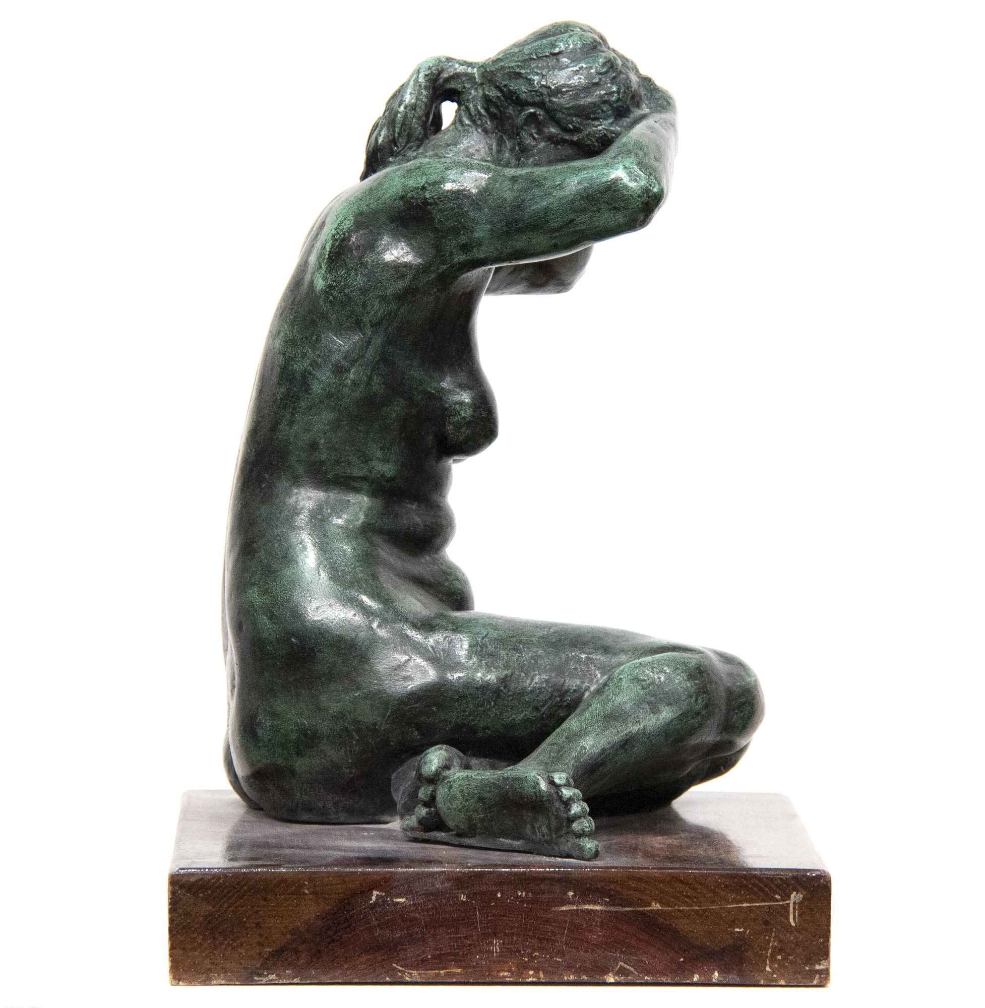 FELIPE CASTANEDA - Mujer Peinandose - bronce - 16 1/4 x 11 3/4 x 11 in.