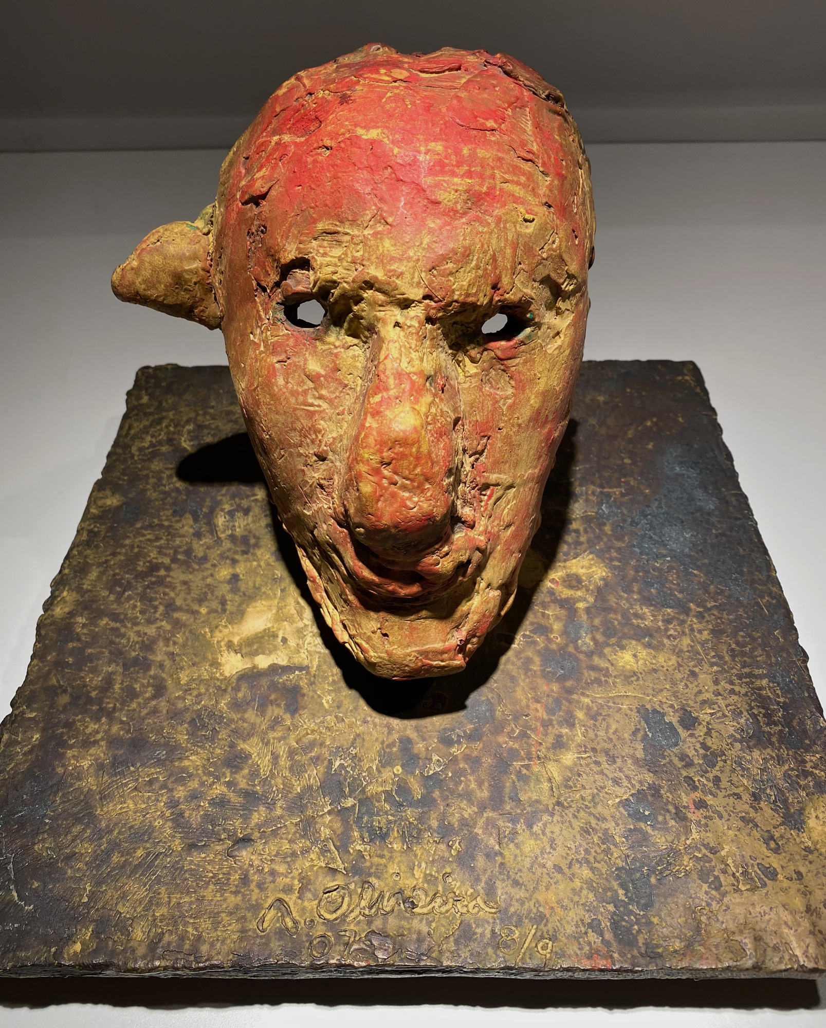 NATHAN OLIVEIRA - Mask #6 (Maroon with Green Ear) - bronze and acrylic - 9 x 11 3/4 x 11 3/4 in.