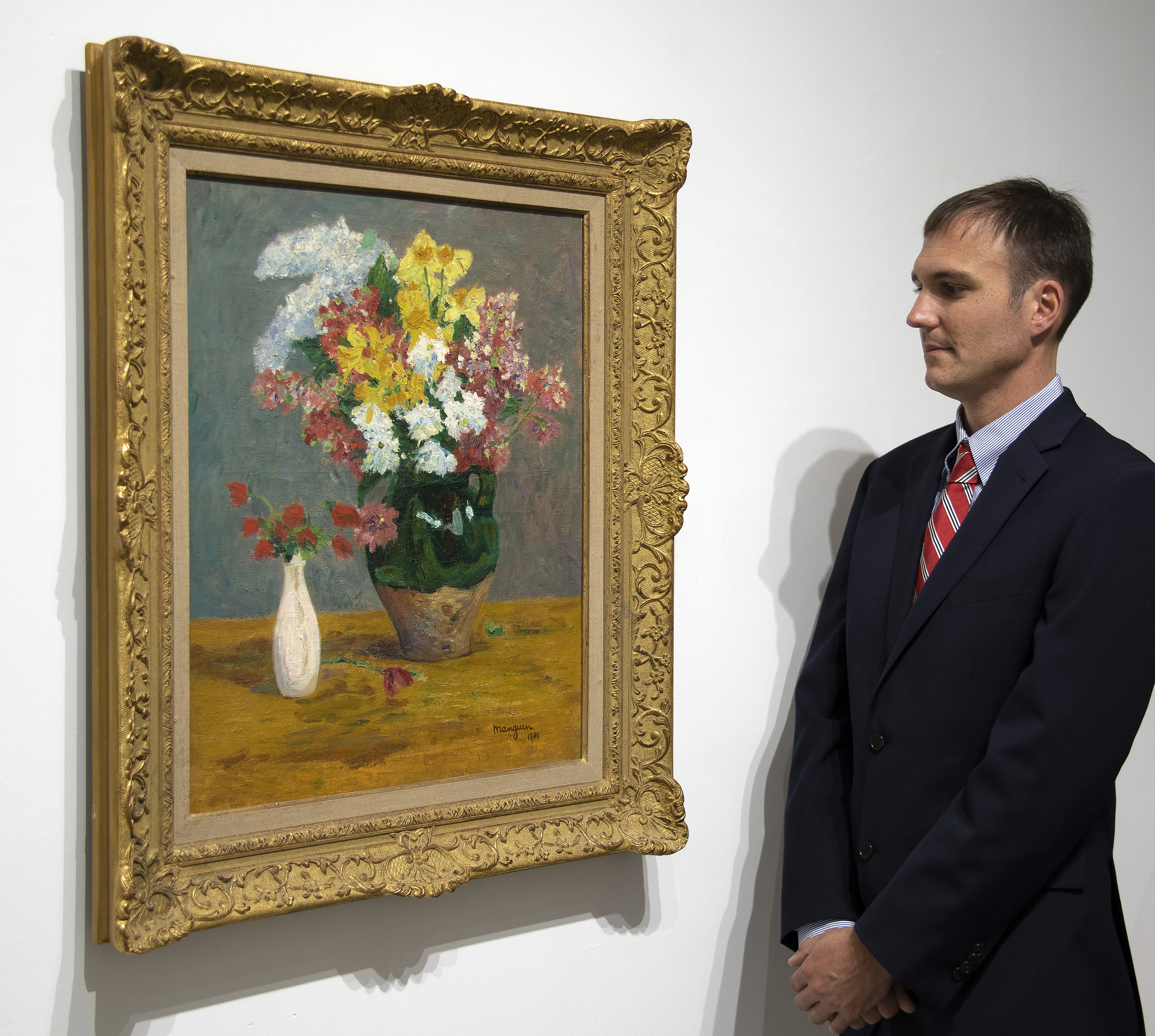 "Bouquets de Fleurs" (1901) is a glowing Post-Impressionist still life. As the revolutionary wave of Impressionism receded from its apex, artists such as Henri Manguin, Henri Matisse, Kees van Dongen, Louis Valtat, and others emerged as part of the new avant-garde in Europe. These “Fauves,” or roughly translated “wild beasts,” would attack their canvases with a bold and vibrant new palette. This completely new way of painting was not initially celebrated by critics, or the artistic elite, but is today recognized among the most innovative and original artistic movements of the 20th Century.    <br><br>The present work, painted just before the revolution of Fauvism took hold, demonstrates a critical transitionary period in Modern Art. The subject is depicted with a masterful compositional sense and attention to spatial relationships. Manguin’s competency in composition would allow him to experiment freely with color during the first decade of the 20th Century. The slightly later but comparable Manguin still life “Flowers” (1915) is in the permanent collection of the Hermitage Museum, St. Petersburg, Russia.