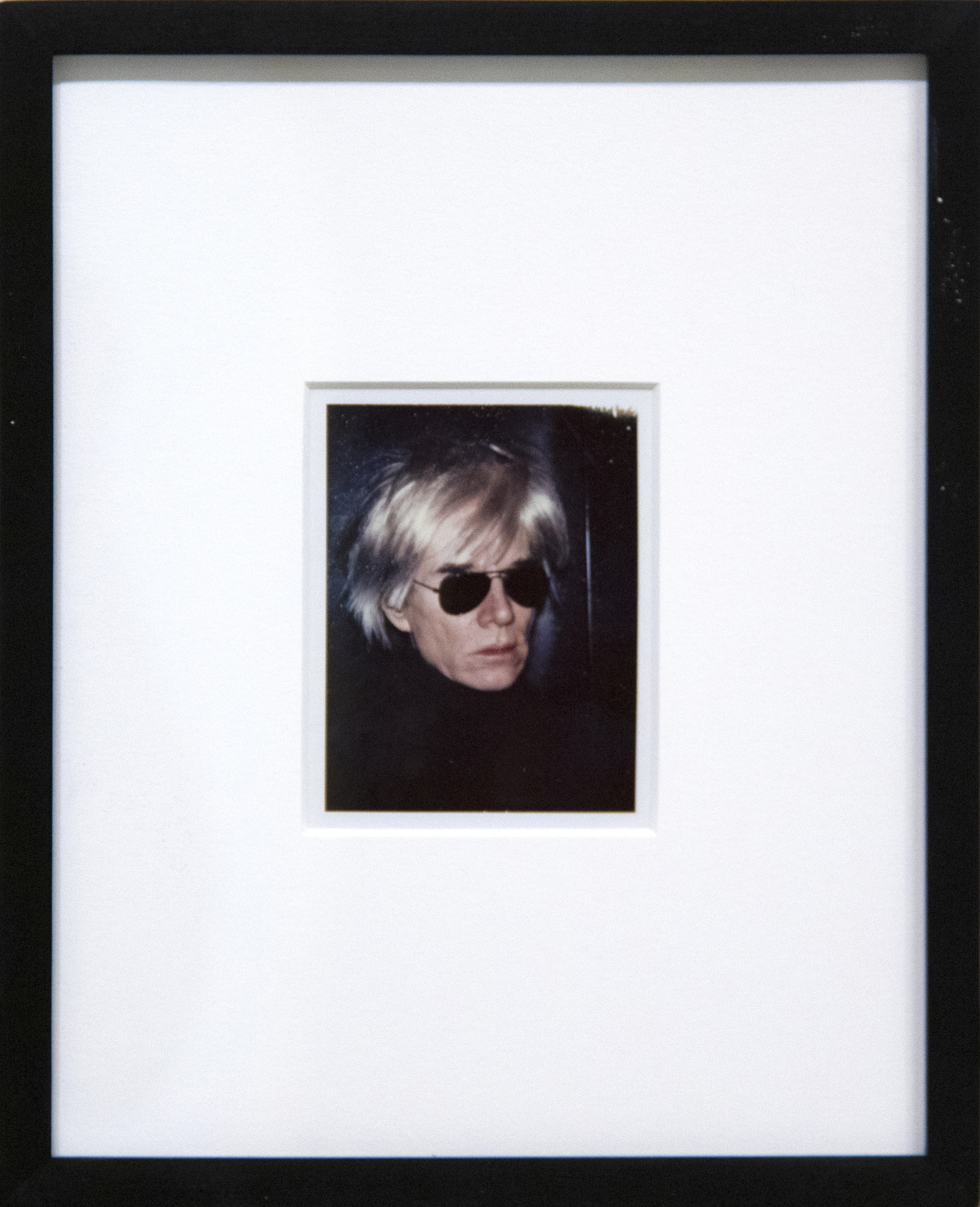 ANDY WARHOL - Self-Portrait in Fright Wig ANDY WARHOL - Self-Portrait in Fright Wig - Polaroid - 4 1/4 x 3 3/8 in.