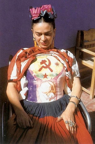 FRIDA KAHLO - Hammer and Sickle (and unborn baby) When Frida Kahlo died in 1954, a grief-stricken Diego Rivera had her belongings locked away for fifteen years, and her personal effects remained sealed, undisturbed, and undocumented until 2004 when the small room in the home her father built in Coyoacán, Mexico was opened to the world. Among the many belongings revealed at Casa Azul were her clothes, jewelry, drawings, letters, documents, and more than 6,500 photographs (among them works by Edward Weston, Tina Modotti, Man Ray, and Nickolas Muray) as well as the most personal and ironically moving item: the orthopedic plaster corsets she turned into an extension of herself. These harsh clinical objects assaulted her free-spirited nature, yet they remain today as the most palpable reminders that as she suffered through unbearable pain — over thirty surgeries, batteries of tests, X-rays, spinal taps, blood transfusions, physical therapy and strong pain killing drugs, she was an absolute survivor, not a victim.
<br>
<br>It was Frida’s father, Guillermo who gave her his box of paints and brushes as she was recovering from the bus accident that had shattered her spine. The devastation she suffered is shown in excruciating detail in her 1944 painting, The Broken Column. Yet the first canvas she painted upon was the most convenient one — the plaster cast bodice encasing her body. As she related, she had dreamed of becoming a doctor, yet “to combat the boredom and pain (and) without giving it any particular thought, I started painting.” Later, her mother asked a carpenter to fashion an easel “if that’s what you can call the special apparatus which could be fixed to my bed because the plaster cast didn’t allow me to sit up.” (Andrea Kettenmann, Frida Kahol: 1907-1954: Pain and Passion, Taschen, 1999, pg. 18)
<br>
<br>On this particular corset, Kahlo painted a blood-red Hammer and Sickle, the symbolic configuration representing proletarian solidarity — a union between the peasantry and working-class expressing her lifelong political sympathies and below, a developing fetus entering perhaps its third trimester, a reminder of the still deeper insult of the accident, the one that added a layer of suffering and regret to Frida’s personal tragedy — her inability to bear children. Frida’s corsets hardened around her resolve as much as her body, but they also speak of her almost unbearable longing. They are ruminations on the power of creativity to heal as well as demonstrations of Frida Kahlo’s unbounded capacity for confronting the very bodily enclosures that imprisoned her, transforming them, taking them over as much as she could, and turning them into something beautiful and expressive.