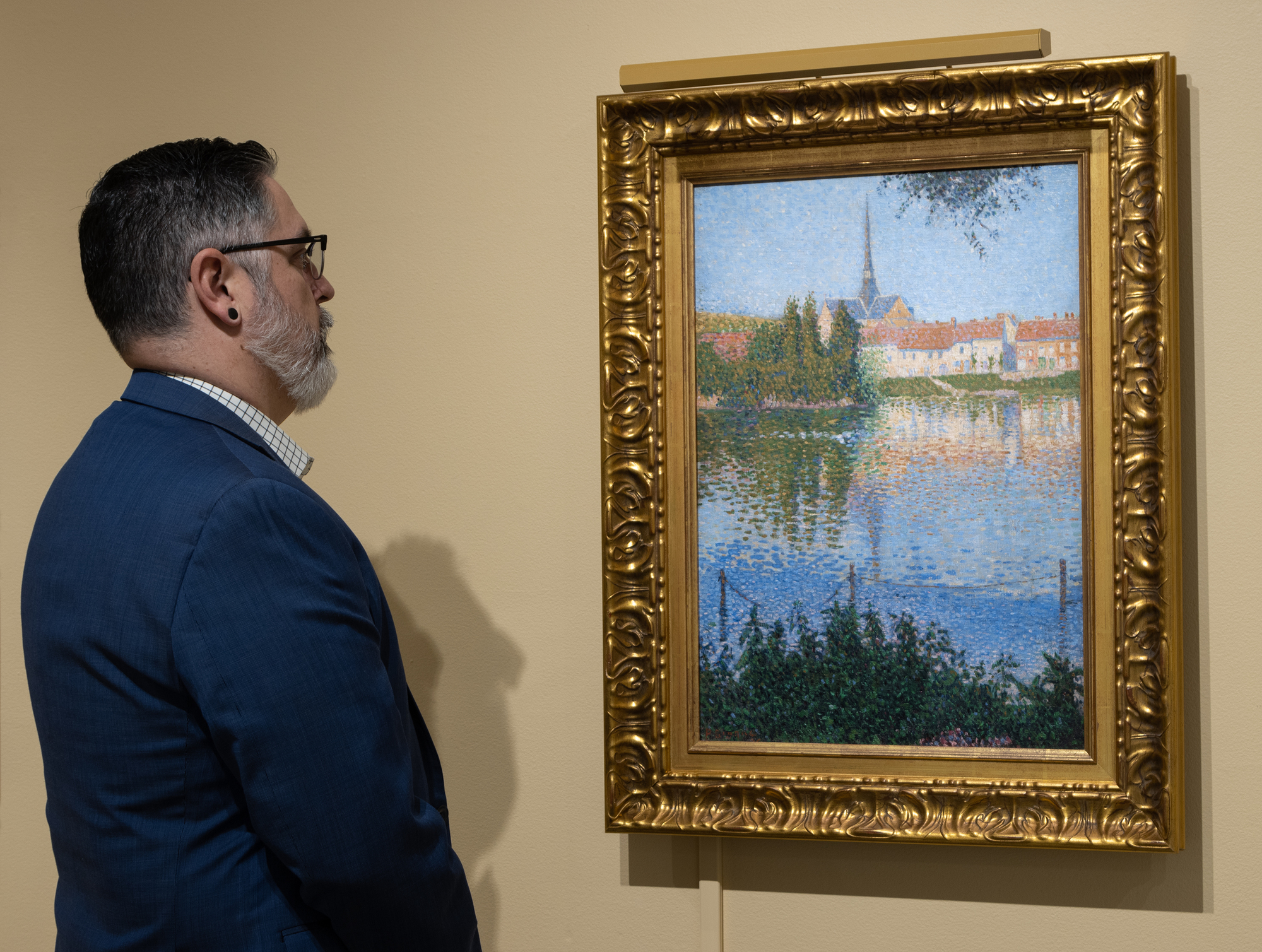 PAUL SIGNAC - Les Andelys. L'Île à Lucas On May 15, 1886, a visual manifesto for a new art movement was born when Georges Seurat’s crowning achievement, A Sunday Afternoon on the Island of La Grande Jatte was unveiled at the Eighth Impressionist Exhibition. Seurat can claim title as the original “Scientific Impressionist” working in a manner that came to be known as Pointillism or Divisionism. It was, however, his friend and the confidant, 24-year-old Paul Signac and their constant dialogue that led to a collaboration in understanding the physics of light and color and the style that emerged. Signac was an untrained, yet a blazingly talented, Impressionist painter whose temperament was perfectly suited to the rigor and discipline required to achieve the painstakingly laborious brushwork and color. Signac quickly assimilated the technique. He also bore witness to Seurat’s arduous two-year journey building myriad layers of unblended dots of color on the colossally-sized La Grande Jatte. Together, Signac, the brash extrovert, and Seurat, a secretive introvert, were about to subvert the course of Impressionism, and change the course of modern art.