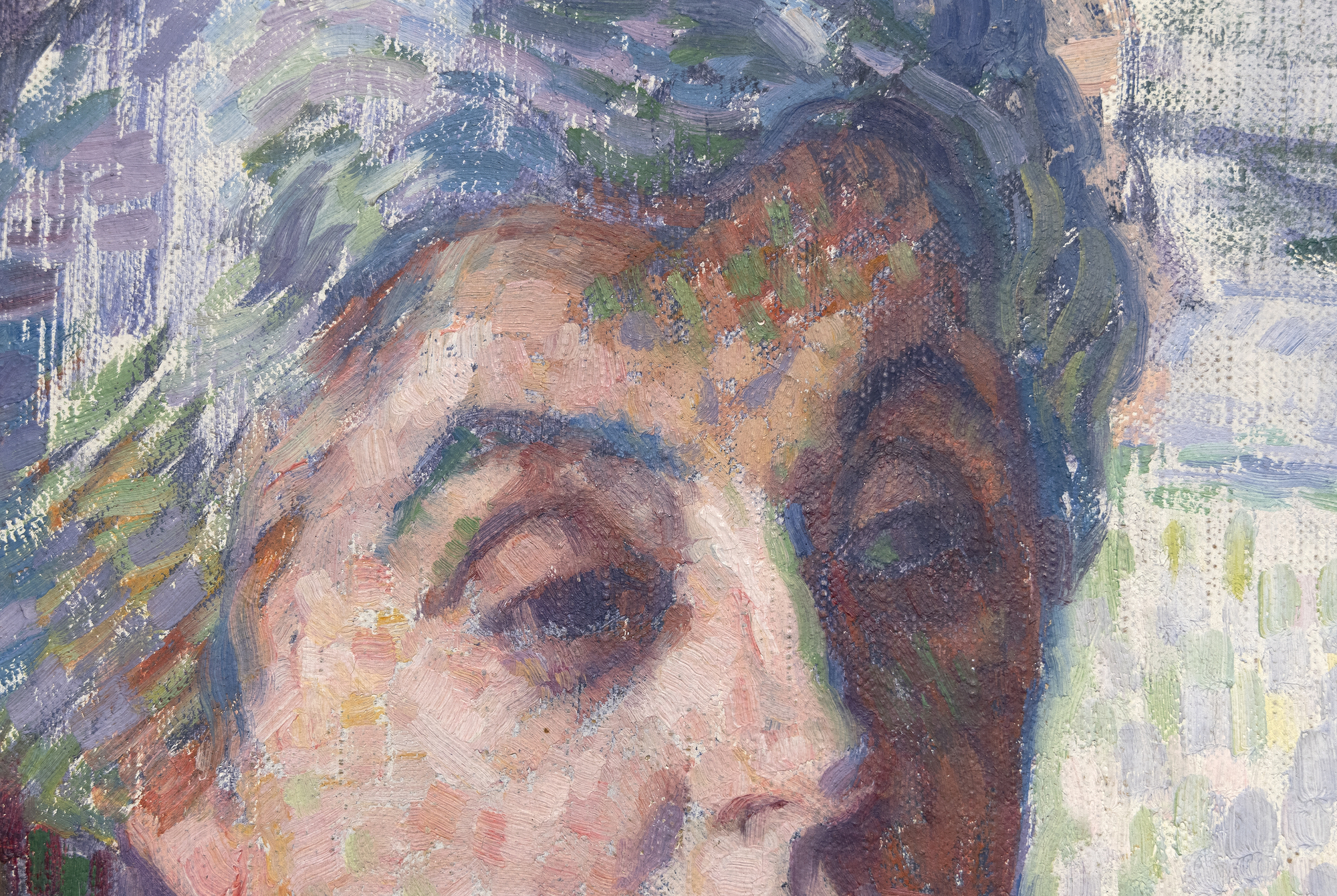 An undisputed master of the booming Belgian Neo-Impressionist movement from 1887 onward, Théo van Rysselberghe painted this portrait of his wife, Maria (née Monnom) during the first decade of the twentieth century. He had pressed onward from the influence of Whistler’s Tonalism, Impressionism, and the Pointillism of Seurat to perfect a highly refined understanding of color, its harmonic resonances, and a meticulous rendering of formal elements. An exemplary draftsman, optical impressions based on color interactions remained a principal concern for Van Rysselberghe. Here, short strokes of color replaced the small dots of a Pointillist, and the color scheme is not the homogenized, harmonious one for which the artist has a well-deserved reputation. Rather, this portrait advances color theory in an entirely different manner. Its visual interest rests with the dynamic contrasts of his wife’s silvered coiffure, her platinum-hued dress, and the stark-white fireplace mantle — all staged within the optical vibrancy of the surround dominated by complementary reds and greens. It is a visually stimulating demonstration by a painter who understood the dynamic impact of this unusual color scheme and who arranged the sitter with a strong accent on a diagonal and executed the formula with the craft and agility of a painter in full control of his painterly assets.