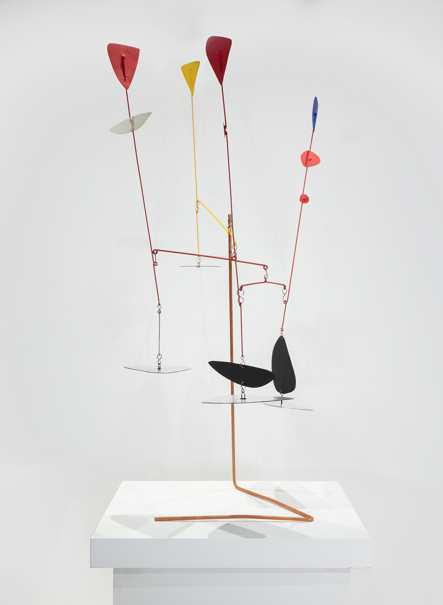ALEXANDER CALDER - Prelude to the Man-Eater Alexander Calder was a key figure in the development of abstract sculpture and is renowned for his groundbreaking work in kinetic art; he is one of the most influential artists of the Twentieth Century. "Prelude to Man-Eater" is a delicately balanced standing sculpture that responds to air currents, creating a constantly changing and dynamic visual experience.<br><br>Calder's Standing Mobiles were a result of his continuous experimentation with materials, form, and balance. This Standing Mobile is a historically significant prelude to a larger work commissioned in 1945 by Alfred Barr, the first director of the Museum of Modern Art in New York. "Prelude to Maneater" is designed to be viewed from multiple angles, encouraging viewers to walk around and interact with it.<br><br>The present work is a formal study for Man-Eater With Pennant (1945), part of the permanent collection of the Museum of Modern Art in New York. The work is also represented in "Sketches for Mobiles: Prelude to Man-Eater; Starfish; Octopus", which is in the permanent collection of the Harvard Fogg Museum.<br><br>Calder's mobiles and stabiles can be found in esteemed private collections and the collections of major museums worldwide, including the Museum of Modern Art in New York, the National Gallery of Art in Washington, D.C., the Whitney Museum of American Art, New York, the Art Institute of Chicago, and the Tate Gallery in London among others.