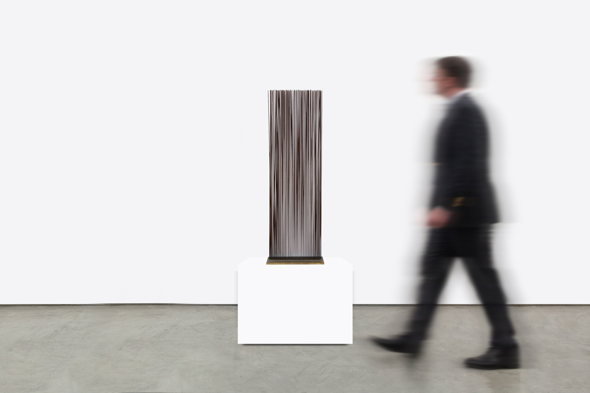 HARRY BERTOIA - Untitled (Sounding Sculpture) <div><font face=Calibri size=3 color=black>Harry Bertoia was an authentic visionary in art, and they are rare. Of those whose métier is sculpture, Alexander Calder and Harry Bertoia are the twentieth-century American standouts. They are engineers of beauty; their creative currency is feats of invention and pure artistry that honor our experience of them (if we are willing to quiet our mind) as if a sacred event. It was Duchamp who suggested Calder call his kinetic works “mobiles”, but it was up to Bertoia himself to coin a word to describe something for which there was little precedent. Visually precise, kinetic, and offering resonant, vibratory sound, a “Sonambient” sculpture is at once a metaphor for our sentient experience in the world yet capable of inducing an aura of transcendent experience. Given that insight, it is easy to understand Bertoia’s view that “I don’t hold onto terms like music and sculpture anymore. Those old distinctions have lost all their meaning.”</font></div>
<br>
<br><div> </div>
<br>
<br><div><font face=Calibri size=3 color=black>The present “Sonambient” sculpture is a forty-eight-inch-tall curtain of thin-gauged tines. Once activated, it becomes a 15 3/4 inch long, 8 inches deep wall of sound. Five rows of narrow tines are staggered in number, alternating between 30 and 29 tines that, when activated, present as an undulating wall of sound. When touched or moved by air currents, the rods produce a sound that, while metallic, does not betray its source of inspiration: the serene connection Bertoia felt in observing the gentle undulating movement of desert grasses. As always, this is a Bertoia sculpture that invites participation in the experience of changing shapes and sounds, a participatory work that asks us to be present in the moment, to connect across time with the object and its creator.</font></div>