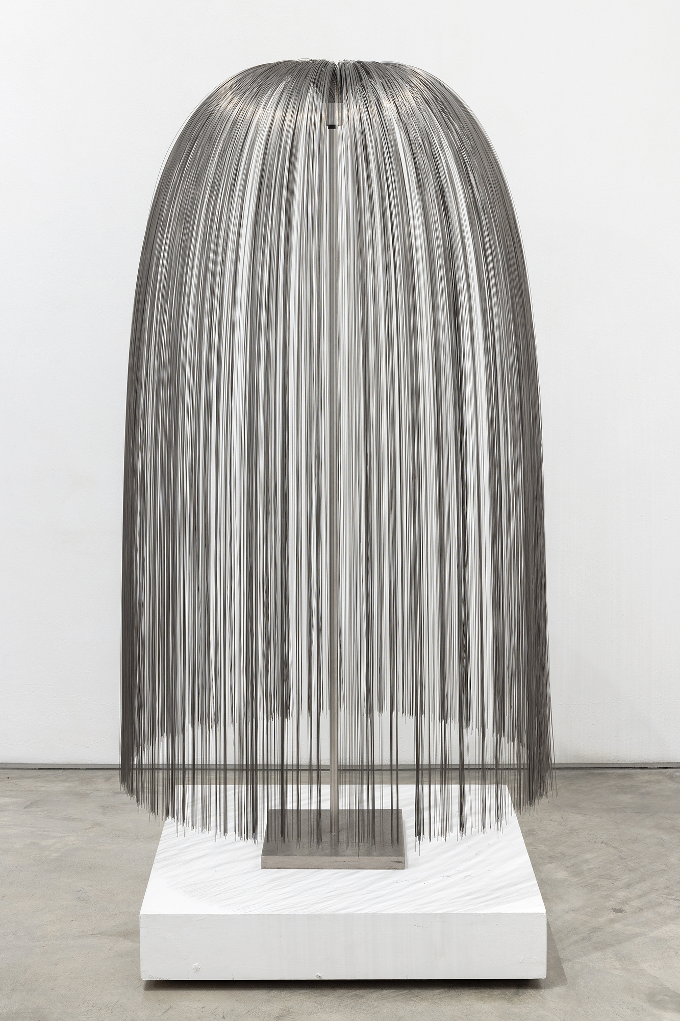 HARRY BERTOIA - Untitled (Willow) <div><font face=Lato size=3 color=black>In Harry Bertoia's oeuvre, "<em>Willow</em>" stands apart as an extraordinary synthesis of natural inspiration and innovative metalwork. Its cascading strands of stainless-steel capture the weeping elegance of a willow tree's drooping branches while introducing a dynamic, interactive quality through its shimmering surface and subtle responsiveness to movement. The strands—whether referred to as "tinsels," "filaments," or "tendrils"—reflect the delicacy of natural forms, blending artistry with technical mastery.</font></div>
<br>
<br><div><font face=Lato size=3> </font></div>
<br>
<br><div><font face=Lato size=3 color=black>Bertoia, a visionary sculptor with an unparalleled ability to transform industrial materials into organic beauty, likely employed meticulous processes to create "<em>Willow,</em>" cutting thin sheets of stainless steel into fine strips and expertly attaching them to a central core, positioning each strand to flow like water or sway like leaves in the breeze. The tactile quality of the strands, which respond to air currents or touch, invites the viewer into a contemplative engagement with the work, much like one might feel beneath the canopy of a willow tree.</font></div>
<br>
<br><div><font face=Lato size=3> </font></div>
<br>
<br><div><font face=Lato size=3 color=black>This piece epitomizes Bertoia's lifelong fascination with nature, stemming from his early years in the rural village of San Lorenzo, Italy. His sensitivity to the organic world continually informed his artistic practice, from his celebrated Sonambient sound sculptures to creations like “<em>Willow</em>, “which reimagine the relationship between form and environment. As he once said, "I no longer hold onto terms like music and sculpture. Those old distinctions have lost all their meaning."</font></div>
<br>
<br><div><font face=Lato size=3> </font></div>
<br>
<br><div><font face=Lato size=3 color=black>Once again , Bertoia captivates us by reaching beyond the traditional boundaries of sculpture, delivering a work that is as much a sensory experience as a visual one. It is a harmonious blend of natural inspiration and innovative artistry, a reminder of the sacred beauty found in the intersection of art and the natural world.</font></div>