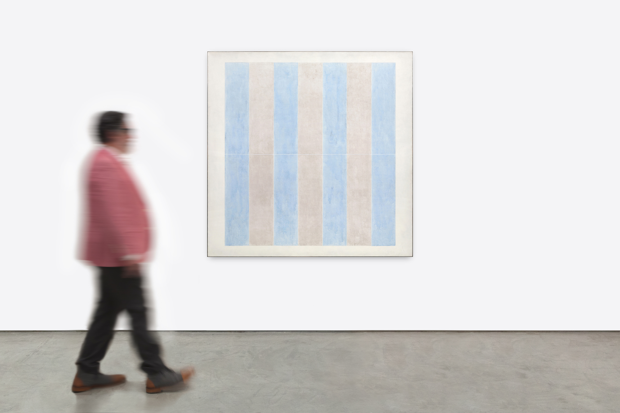 AGNES MARTIN - Untitled No. 7 Of the many modernist painters who imbued their geometries with a spiritual dimension, Agnes Martin is the one whose paintings resonate most deeply with a life of ascetic simplicity. In 1967, she left New York City and the art world, renounced worldly pursuits, and embarked on an eighteen-month odyssey across the untamed Western American landscape. It was the prelude to a life of seclusion, where on a remote mesa near Cuba, New Mexico, Martin built a sanctuary by hand, shaping adobe and timber into a unique domicile. Living without the conveniences of a telephone, electricity, or indoor plumbing, she practiced the art of life, not the life of a painter. That deeply devoted spiritual and moral quest separates Agnes Martin from the geometric visionaries such as Piet Mondrian or Ad Reinhardt, with whom she would otherwise be associated. After a seven-year hiatus, 62-year-old Martin reemerged in 1974 to renew her journey creating radiant minimalist paintings.
<br>
<br>"No. 7" (1974) is among the earliest paintings from this second major phase of her career. Intent upon emphasizing a dramatic reorientation emphasizing color rather than the line or tabulated grids of her pre-1967 work, a distanced viewing of the pale, luminescent bands allows for an expansive appreciation of subtle, radiant shifts between the color zones. Numerous natural phenomena and elements embedded in the New Mexican desert experience may have inspired these new and expansive ideas. The sheer verticality of its mesas, cliffs, and ravines, or the shafts of light that dramatically stream through gaps in clouds to the desert floor, may have inspired the vertical orientation here. Yet the impact of "No. 7" (1974) is most assuredly delivered via her devotion to Buddhist and Daoist ideals that seek beauty from within, not from extraneous points of reference. Martin asks the viewer to think of her repetitive shafts or bands of pale color as a sort of mantra as much as a visual experience. She challenges the capacity of our imagination, encouraging it to run free and consider this work as an object of contemplation, knowing well that her paintings require a degree of commitment. And as if to admonish those without the patience to absorb the impact of the otherworldly mystical radiance inherent in the paintings or how they affect one's greater awareness of the potential for expressing the sublime, we have her comment, "There's nobody who can't stand all afternoon in front of a waterfall."