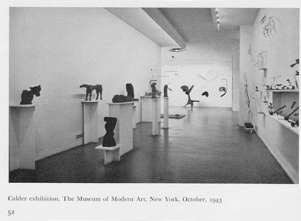 After disappointing sales at Weyhe Gallery in 1928, Calder turned from sculpted wire portraits and figures to the more conventional medium of wood. On the advice of sculptor Chaim Gross, he purchased small blocks of wood from Monteath, a Brooklyn supplier of tropical woods. He spent much of that summer on a Peekskill, New York farm carving. In each case, the woodblock suggested how he might preserve its overall shape and character as he subsumed those attributes in a single form.  There was a directness about working in wood that appealed to him. Carved from a single block of wood, Woman with Square Umbrella is not very different from the subjects of his wire sculptures except that he supplanted the ethereal nature of using wire with a more corporeal medium.&lt;br&gt;© 2023 Calder Foundation, New York / Artists Rights Society (ARS), New York