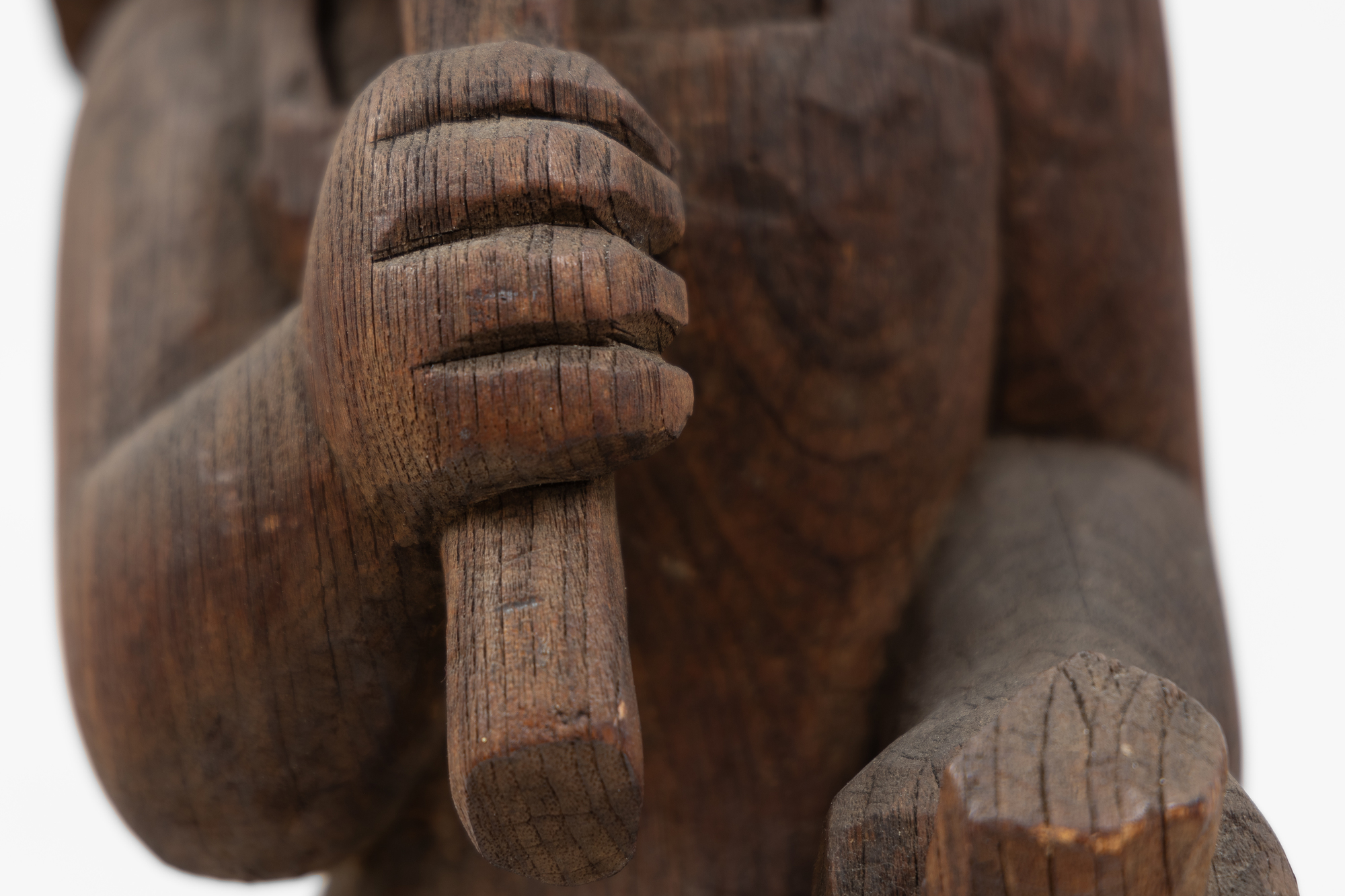 After disappointing sales at Weyhe Gallery in 1928, Calder turned from sculpted wire portraits and figures to the more conventional medium of wood. On the advice of sculptor Chaim Gross, he purchased small blocks of wood from Monteath, a Brooklyn supplier of tropical woods. He spent much of that summer on a Peekskill, New York farm carving. In each case, the woodblock suggested how he might preserve its overall shape and character as he subsumed those attributes in a single form.  There was a directness about working in wood that appealed to him. Carved from a single block of wood, Woman with Square Umbrella is not very different from the subjects of his wire sculptures except that he supplanted the ethereal nature of using wire with a more corporeal medium.&lt;br&gt;© 2023 Calder Foundation, New York / Artists Rights Society (ARS), New York