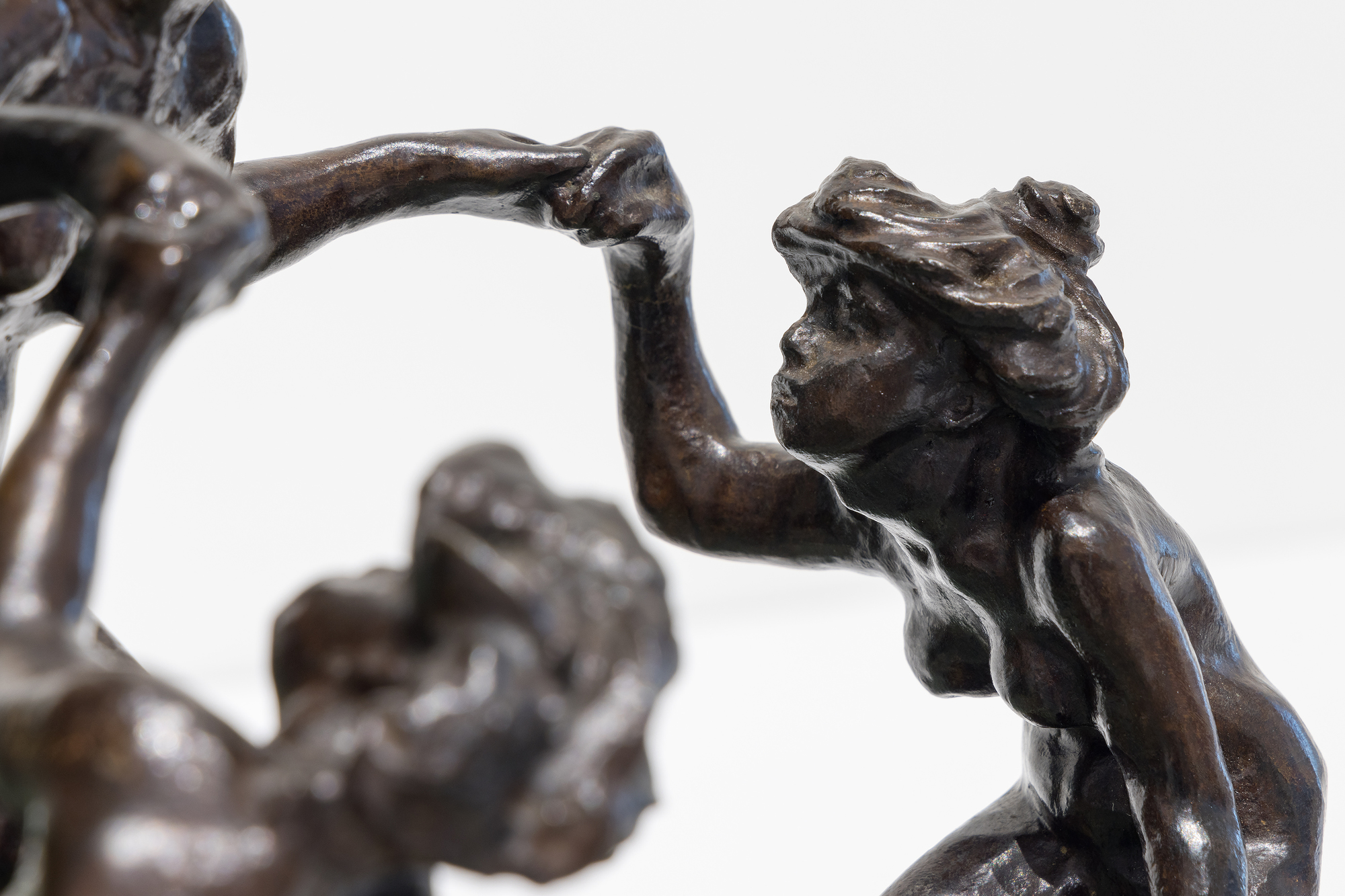 &lt;div&gt;&lt;font face=Calibri size=3 color=black&gt;Camille Claudel&#039;s life story reflects an era when societal constraints often dimmed the brilliance of women; their genius was viewed as a threat to the male-dominated world. Most introductions to Claudel are steeped in misleading biographical details related to her as Rodin&#039;s assistant, mistress, or lover, associations that diminish her achievements as a first-rate sculptor whose work borrows little from Rodin in style or subject matter. Despite these challenges, Claudel&#039;s legacy has endured, celebrated through exhibitions, biographies, and films since her rediscovery in 1982. &lt;/font&gt;&lt;/div&gt;&lt;br&gt;&lt;br&gt;&lt;div&gt;&nbsp;&lt;/div&gt;&lt;br&gt;&lt;br&gt;&lt;div&gt;&lt;font face=Calibri size=3 color=black&gt;&lt;em&gt;“La Vague (The Wave),”&lt;/em&gt; a remarkable sculpture of three women frolicking joyfully, embodies Claudel&#039;s passion for art and connection to nature. The women, their hair unruly like the sea, are depicted in a moment of freedom and abandon, yet the looming wave hints at the inevitable sorrow to come—a metaphor for Claudel&#039;s life, shadowed by fate. This piece, initially shown in plaster and later cast in bronze with an onyx marble wave, draws direct inspiration from Hokusai&#039;s &lt;em&gt;“The Great Wave,”&lt;/em&gt; reflecting the Parisian fascination with Japanese art at the time. While &lt;em&gt;“La Vague”&lt;/em&gt; showcases Claudel&#039;s technical mastery and the influence of Japanese aesthetics, it also poignantly symbolizes her acceptance of the overpowering forces of nature and the tragic course her life would ultimately take. This bronze, cast in 1997, is one of only two not held in a museum, further emphasizing the rarity of and reverence for Claudel&#039;s work.&lt;/font&gt;&lt;/div&gt;