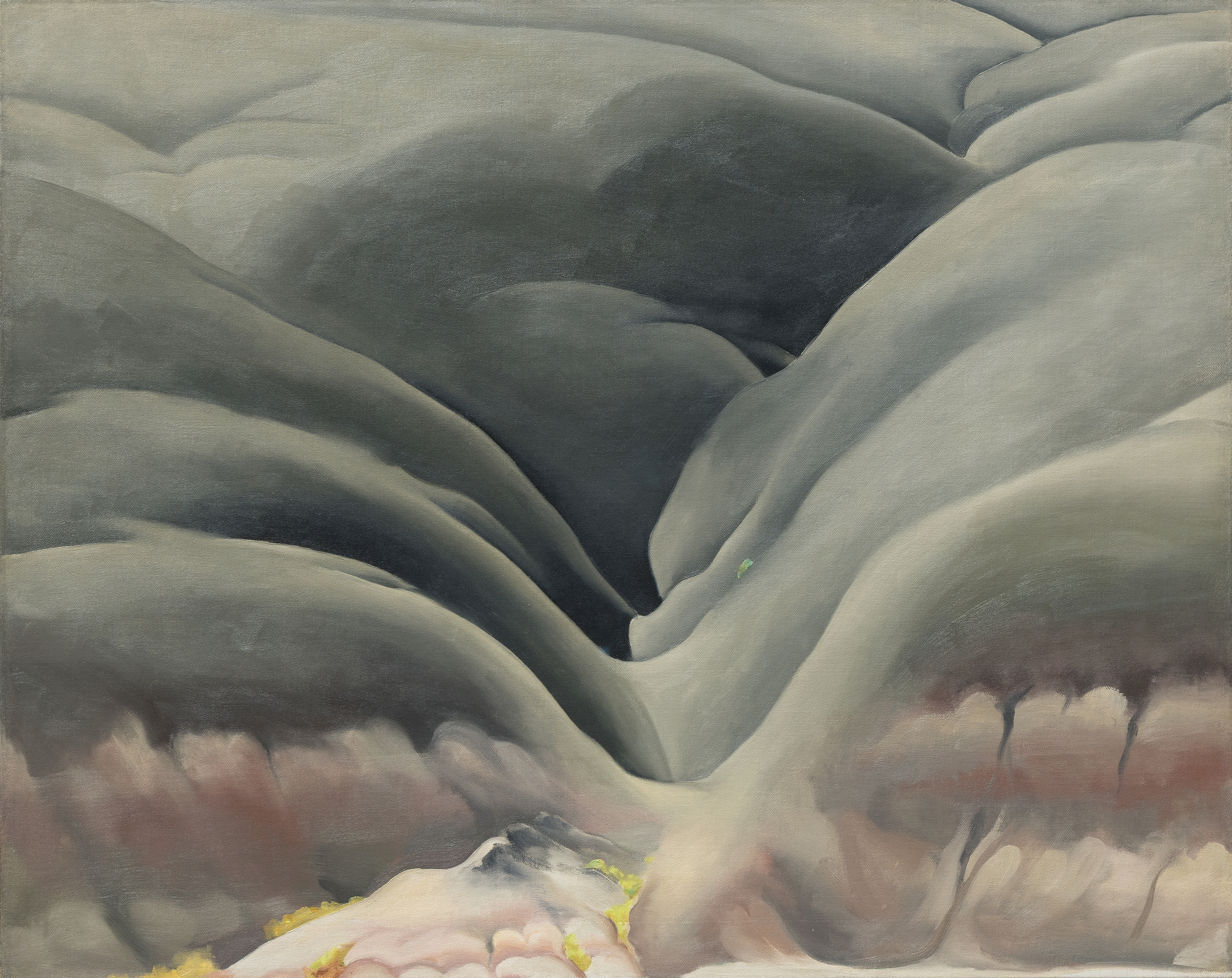 <div>Georgia O’Keeffe’s <em>Black Place II</em> (1945) belongs to one of the most profound and austere series of her career, inspired by repeated journeys to the Bisti Badlands, a remote, otherworldly area of northwestern New Mexico that she called the Black Place. Deeply compelled by this landscape, O’Keeffe often camped there so she could study its shifting forms and tonal subtleties at different hours of the day. In this work, she reduces the scene to its essentials: two massive hills pressing together, no visible horizon, and a composition defined by gravity, stillness, and quiet monumentality. The sweeping, interlocking forms create a sense of scale that feels both intimate and immense, evoking a landscape experienced as presence rather than panorama. </div><br><br><div>&nbsp;</div><br><br><div>Works from the Black Place series are exceptionally rare. Of the fourteen canvases O’Keeffe painted, only four remain in private hands; the remainder are held by major institutions including The Metropolitan Museum of Art, SFMOMA, and the Art Institute of Chicago. As a result, opportunities to encounter a work from this group outside of museum collections are exceedingly uncommon. </div><br><br><div>&nbsp;</div><br><br><div><em>Black Place II </em>has an illustrious lineage, from its earliest days in the holdings of Alfred Stieglitz’s famous New York gallery, An American Place, to the noted Philadelphia philanthropist and collector Daniel Dietrich, to the collection of Jan T. and Marica Vilcek. The painting’s legacy is further underscored by its unusually long institutional life. It was shown as early as 1946 at Stieglitz’s An American Place, and has continued to appear in major institutional retrospectives, including exhibitions at the Centre Pompidou and, most recently, the Museum of Fine Arts, Boston. This sustained public and scholarly attention has firmly established the importance of the Black Place paintings within O’Keeffe’s oeuvre. </div>