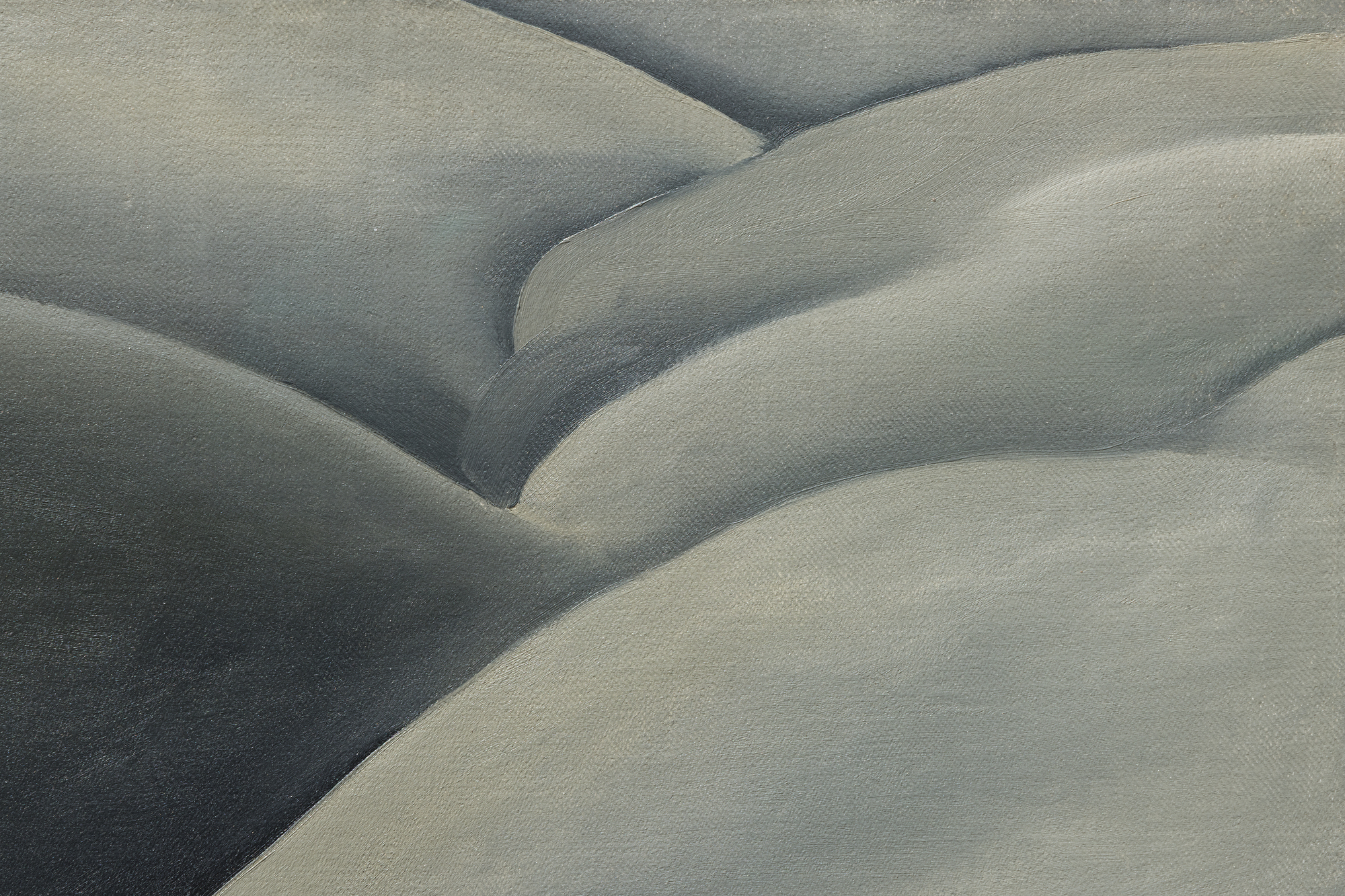 <div>Georgia O’Keeffe’s <em>Black Place II</em> (1945) belongs to one of the most profound and austere series of her career, inspired by repeated journeys to the Bisti Badlands, a remote, otherworldly area of northwestern New Mexico that she called the Black Place. Deeply compelled by this landscape, O’Keeffe often camped there so she could study its shifting forms and tonal subtleties at different hours of the day. In this work, she reduces the scene to its essentials: two massive hills pressing together, no visible horizon, and a composition defined by gravity, stillness, and quiet monumentality. The sweeping, interlocking forms create a sense of scale that feels both intimate and immense, evoking a landscape experienced as presence rather than panorama. </div><br><br><div>&nbsp;</div><br><br><div>Works from the Black Place series are exceptionally rare. Of the fourteen canvases O’Keeffe painted, only four remain in private hands; the remainder are held by major institutions including The Metropolitan Museum of Art, SFMOMA, and the Art Institute of Chicago. As a result, opportunities to encounter a work from this group outside of museum collections are exceedingly uncommon. </div><br><br><div>&nbsp;</div><br><br><div><em>Black Place II </em>has an illustrious lineage, from its earliest days in the holdings of Alfred Stieglitz’s famous New York gallery, An American Place, to the noted Philadelphia philanthropist and collector Daniel Dietrich, to the collection of Jan T. and Marica Vilcek. The painting’s legacy is further underscored by its unusually long institutional life. It was shown as early as 1946 at Stieglitz’s An American Place, and has continued to appear in major institutional retrospectives, including exhibitions at the Centre Pompidou and, most recently, the Museum of Fine Arts, Boston. This sustained public and scholarly attention has firmly established the importance of the Black Place paintings within O’Keeffe’s oeuvre. </div>
