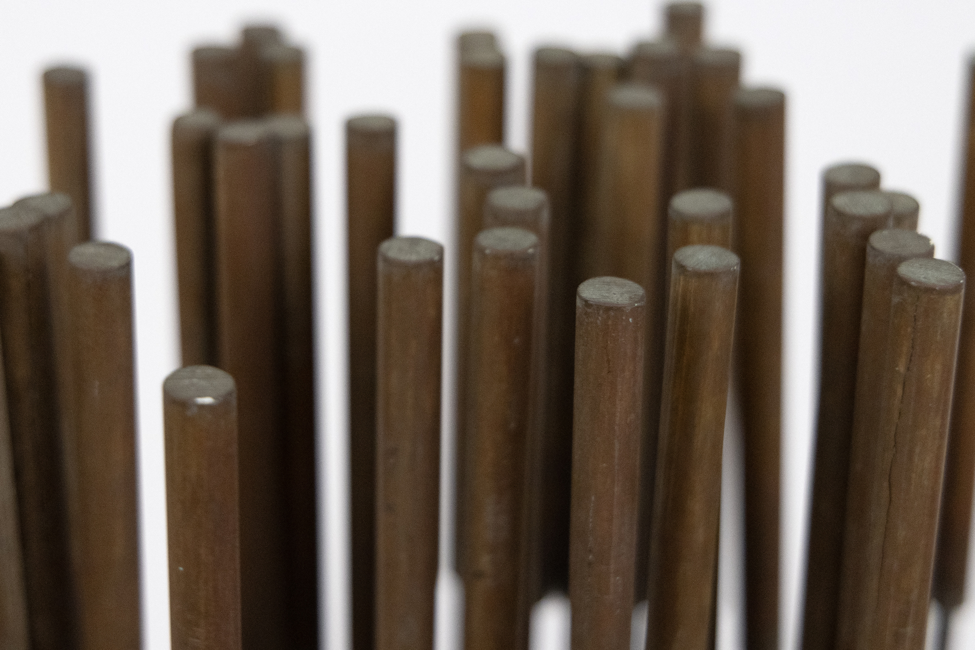 &lt;div&gt;&lt;font face=Calibri size=3 color=black&gt;Harry Bertoia’s “Sonambient” sculptures are a mesmerizing blend of art, sound, and science, and this 36-tine piece is a quintessential example of his innovative genius. Meticulously crafted with 36 rods aligned in a precise six-by-six configuration on a square base, this 77-inch-tall work embodies the harmonious intersection of visual beauty and auditory wonder.&lt;/font&gt;&lt;/div&gt;&lt;br&gt;&lt;br&gt;&lt;div&gt;&nbsp;&lt;/div&gt;&lt;br&gt;&lt;br&gt;&lt;div&gt;&lt;font face=Calibri size=3 color=black&gt;Made from beryllium copper, a material favored by Bertoia for its superior acoustic properties and aesthetic appeal, the rods have developed a rich walnut-like patina over time. This patina adds to the sculpture’s visual allure, enhancing its historical and artistic value, and reflects a natural aging process that the artist himself, a naturalist, would have admired. When activated by touch or the movement of air, the rods produce a perceptible, fixed note accompanied by a range of ethereal tones, transforming the sculpture from a static object into a dynamic, multisensory experience. The long, swaying motion of the tall rods, reminiscent of the undulating desert grasses that inspired the artist initially, adds a captivating visual dimension. The cattail-like finials further evoke natural forms, underscoring Bertoia’s inspiration derived from the natural world.&lt;/font&gt;&lt;/div&gt;&lt;br&gt;&lt;br&gt;&lt;div&gt;&nbsp;&lt;/div&gt;&lt;br&gt;&lt;br&gt;&lt;div&gt;&lt;font face=Calibri size=3 color=black&gt;Bertoia’s 36-tine “Sonambient” sculpture is more than a visual masterpiece; it profoundly explores sound, material, and participatory interaction. It exemplifies Bertoia’s belief in art as an immersive and evolving experience, where each encounter offers discoveries and sensations. Through this work, Bertoia has created a timeless piece that continues to captivate and inspire, highlighting his artistic vision&#039;s enduring power and deep connection to nature’s spiritual qualities.&lt;/font&gt;&lt;/div&gt;