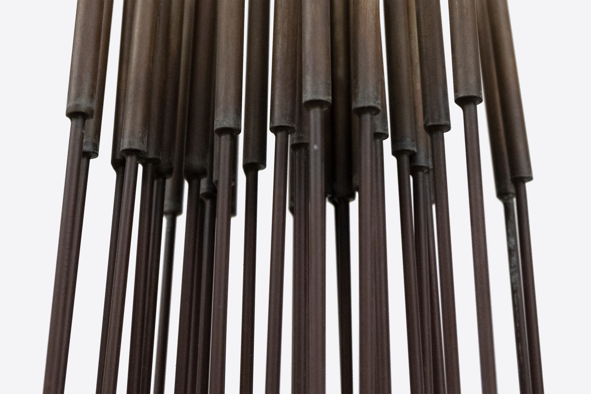 &lt;div&gt;&lt;font face=Calibri size=3 color=black&gt;Harry Bertoia’s “Sonambient” sculptures are a mesmerizing blend of art, sound, and science, and this 36-tine piece is a quintessential example of his innovative genius. Meticulously crafted with 36 rods aligned in a precise six-by-six configuration on a square base, this 77-inch-tall work embodies the harmonious intersection of visual beauty and auditory wonder.&lt;/font&gt;&lt;/div&gt;&lt;br&gt;&lt;br&gt;&lt;div&gt;&nbsp;&lt;/div&gt;&lt;br&gt;&lt;br&gt;&lt;div&gt;&lt;font face=Calibri size=3 color=black&gt;Made from beryllium copper, a material favored by Bertoia for its superior acoustic properties and aesthetic appeal, the rods have developed a rich walnut-like patina over time. This patina adds to the sculpture’s visual allure, enhancing its historical and artistic value, and reflects a natural aging process that the artist himself, a naturalist, would have admired. When activated by touch or the movement of air, the rods produce a perceptible, fixed note accompanied by a range of ethereal tones, transforming the sculpture from a static object into a dynamic, multisensory experience. The long, swaying motion of the tall rods, reminiscent of the undulating desert grasses that inspired the artist initially, adds a captivating visual dimension. The cattail-like finials further evoke natural forms, underscoring Bertoia’s inspiration derived from the natural world.&lt;/font&gt;&lt;/div&gt;&lt;br&gt;&lt;br&gt;&lt;div&gt;&nbsp;&lt;/div&gt;&lt;br&gt;&lt;br&gt;&lt;div&gt;&lt;font face=Calibri size=3 color=black&gt;Bertoia’s 36-tine “Sonambient” sculpture is more than a visual masterpiece; it profoundly explores sound, material, and participatory interaction. It exemplifies Bertoia’s belief in art as an immersive and evolving experience, where each encounter offers discoveries and sensations. Through this work, Bertoia has created a timeless piece that continues to captivate and inspire, highlighting his artistic vision&#039;s enduring power and deep connection to nature’s spiritual qualities.&lt;/font&gt;&lt;/div&gt;