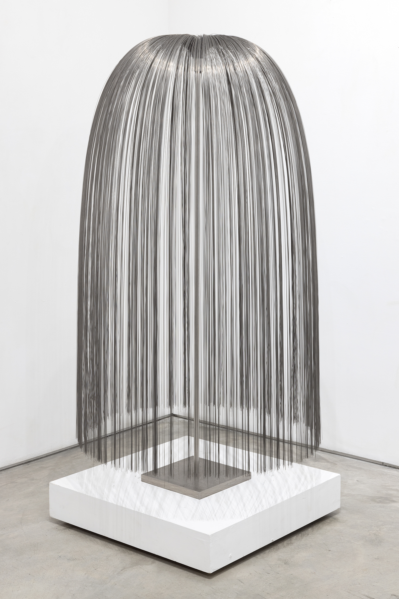 <div><font face=Lato size=3 color=black>In Harry Bertoia's oeuvre, "<em>Willow</em>" stands apart as an extraordinary synthesis of natural inspiration and innovative metalwork. Its cascading strands of stainless-steel capture the weeping elegance of a willow tree's drooping branches while introducing a dynamic, interactive quality through its shimmering surface and subtle responsiveness to movement. The strands—whether referred to as "tinsels," "filaments," or "tendrils"—reflect the delicacy of natural forms, blending artistry with technical mastery.</font></div>
<br>
<br><div><font face=Lato size=3> </font></div>
<br>
<br><div><font face=Lato size=3 color=black>Bertoia, a visionary sculptor with an unparalleled ability to transform industrial materials into organic beauty, likely employed meticulous processes to create "<em>Willow,</em>" cutting thin sheets of stainless steel into fine strips and expertly attaching them to a central core, positioning each strand to flow like water or sway like leaves in the breeze. The tactile quality of the strands, which respond to air currents or touch, invites the viewer into a contemplative engagement with the work, much like one might feel beneath the canopy of a willow tree.</font></div>
<br>
<br><div><font face=Lato size=3> </font></div>
<br>
<br><div><font face=Lato size=3 color=black>This piece epitomizes Bertoia's lifelong fascination with nature, stemming from his early years in the rural village of San Lorenzo, Italy. His sensitivity to the organic world continually informed his artistic practice, from his celebrated Sonambient sound sculptures to creations like “<em>Willow</em>, “which reimagine the relationship between form and environment. As he once said, "I no longer hold onto terms like music and sculpture. Those old distinctions have lost all their meaning."</font></div>
<br>
<br><div><font face=Lato size=3> </font></div>
<br>
<br><div><font face=Lato size=3 color=black>Once again , Bertoia captivates us by reaching beyond the traditional boundaries of sculpture, delivering a work that is as much a sensory experience as a visual one. It is a harmonious blend of natural inspiration and innovative artistry, a reminder of the sacred beauty found in the intersection of art and the natural world.</font></div>