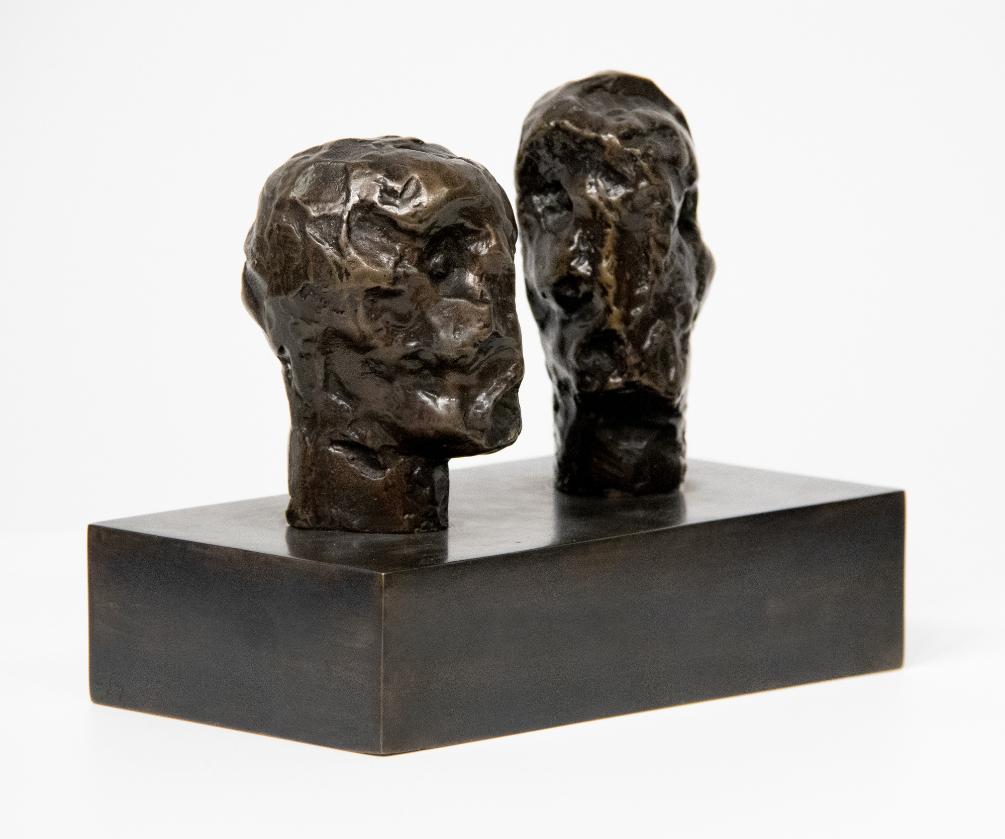 HENRY MOORE - Emperor&#039;s Heads - Bronze with brown patina - 6 3/4 x 8 1/4 x 4 1/2 in.