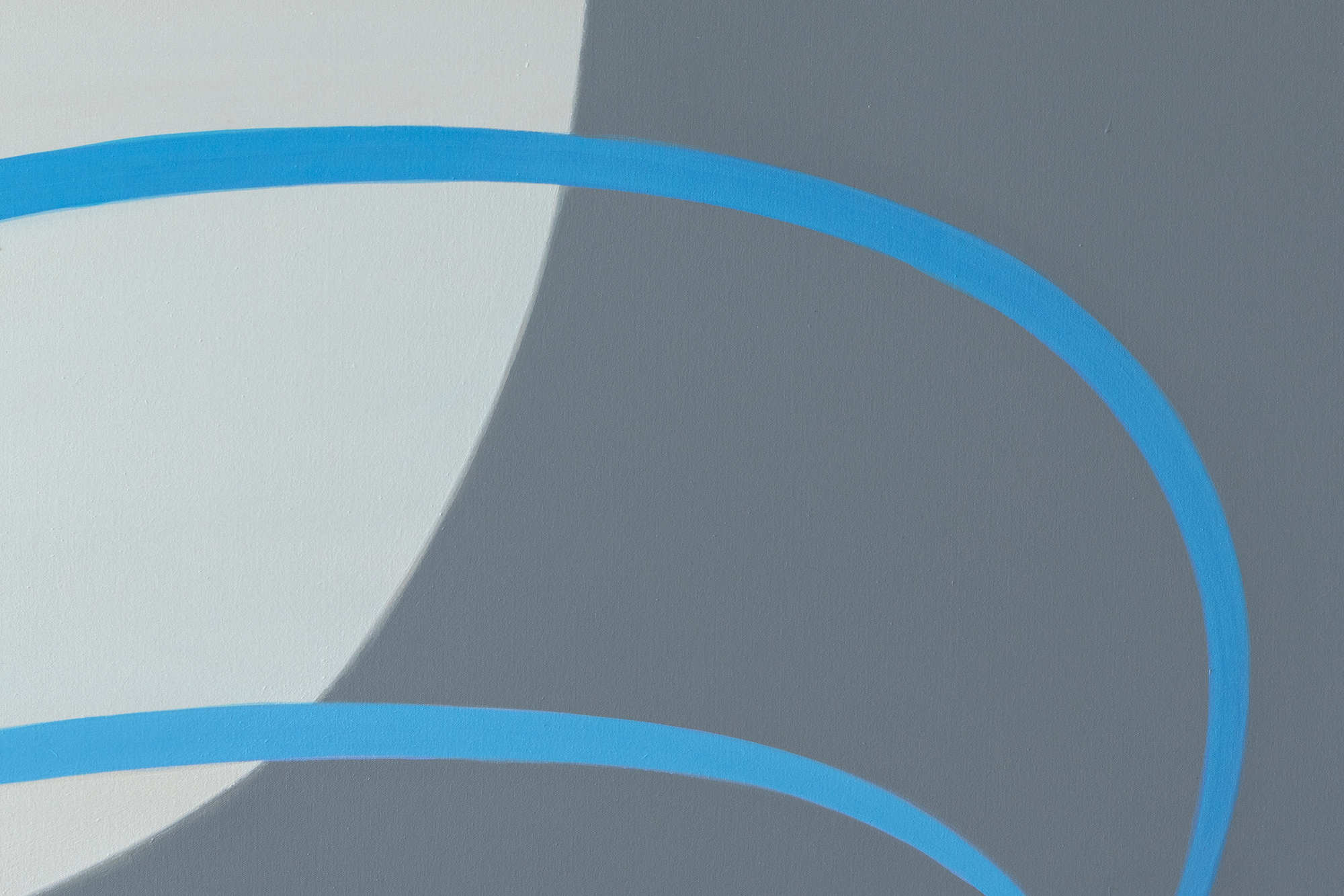 <div>Joanna Pousette-Dart’s 3 Part Variation No. 11 (2017) is composed of three stacked, curvilinear canvases—forms that resemble canoe hulls or slices of a circle—rising in scale from bottom to top. Each panel has its own restrained palette of blues, yellows, and grays, distinct yet resonant with the others. The proportions and curves echo from one to the next, yet no two forms are alike. </div>
<br>
<br><div> </div>
<br>
<br><div>Within each panel, broad areas of flat color are bisected by rounded shapes whose outer contours align with the painting’s edge. Layered over these are linear arabesque-like structures that visually rhyme—but never directly repeat—the panels’ curves, creating a dynamic interplay between inner drawing and outer shape. The result is both lyrical and precise, a composition where subtle variations generate a complex harmony. </div>
<br>
<br><div> </div>
<br>
<br><div>The beauty of 3 Part Variation No. 11 lies in these relationships: how forms mirror, diverge, and converge across the three canvases. The effect is meditative, like a visual equation that is at once architectural and deeply personal. </div>