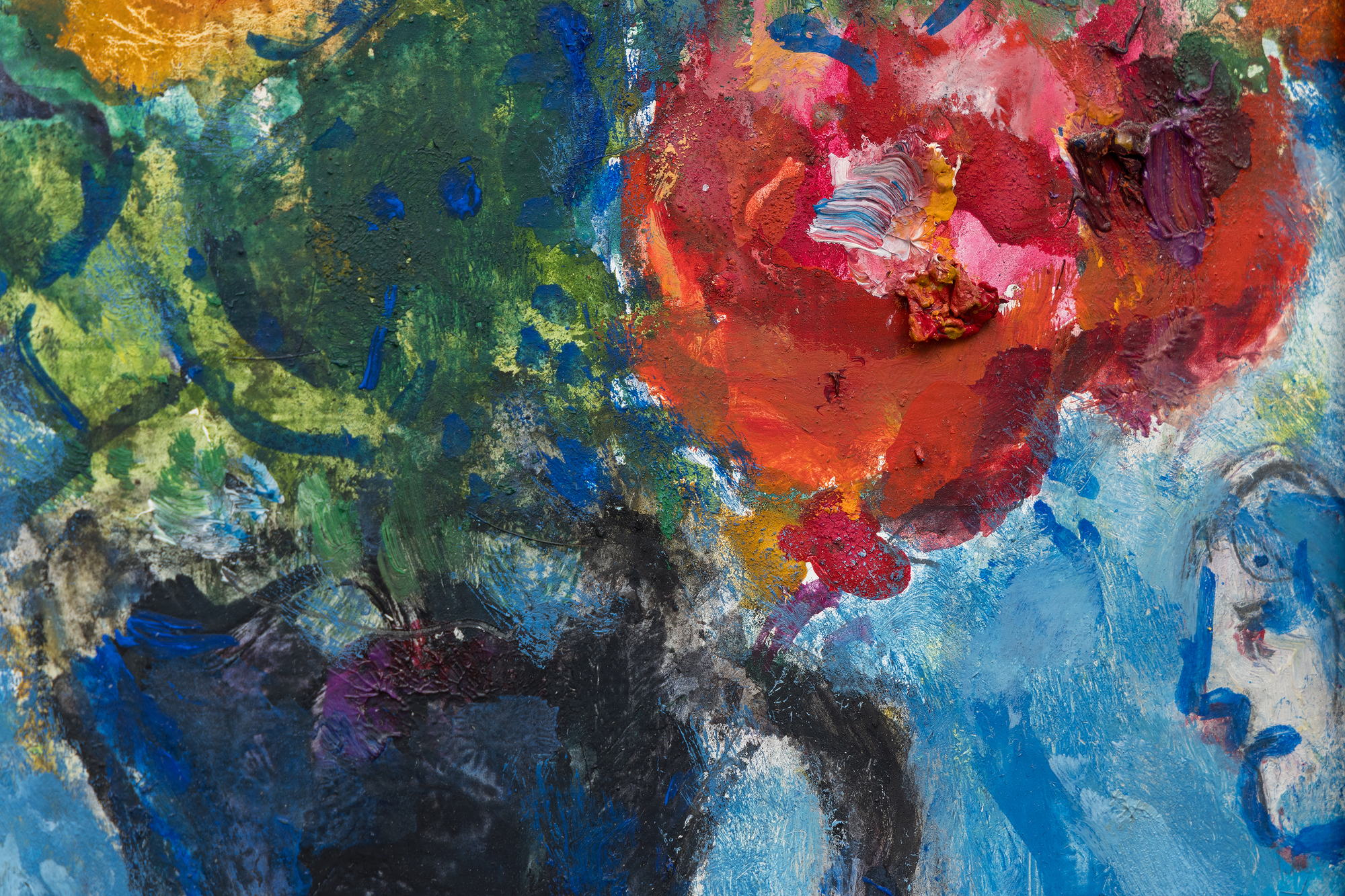 <div><font face=Lato size=3 color=black>Marc Chagall’s <em>Sur la table</em> is a radiant celebration of color, memory, and imagination. Bathed in a deep blue palette, the painting brings together several of the artist’s most beloved motifs: a rooster, violinist, goat, and exuberant bouquet. The composition is animated with Chagall’s signature sense of movement and dreamlike harmony, creating a world where everyday life, folklore, and love coexist in vibrant equilibrium.</font></div><br><br><div>&nbsp;</div><br><br><div><font face=Lato size=3 color=black>Painted in a richly productive period just after Chagall’s return to his homeland in the early 1970s, <em>Sur la table</em> reflects the renewed emotional and visual energy that came from reconnecting with his roots in Vitebsk, represented here by the white domed church in the distance. The expansive bouquet, one of Chagall’s enduring symbols of love for his first wife, Bella, dominates the foreground and infuses the work with emotional warmth and vitality.</font></div><br><br><div>&nbsp;</div><br><br><div><font face=Lato size=3 color=black>The painting remained in Chagall’s own collection and estate until after his death in 1985, underscoring its personal significance. Authenticated by the Comité Marc Chagall, <em>Sur la table</em> belongs to a lineage of floral and symbolic compositions that define his mature work.</font></div>