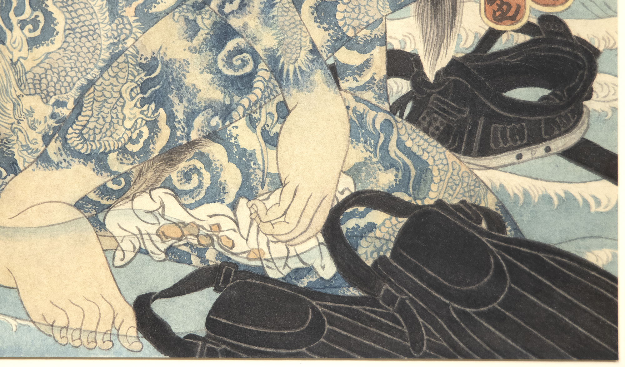 MASAMI TERAOKA - Wave Series/Tattooed Woman at Sunset Beach Born in Onomichi in Hiroshima Prefecture, Teraoka studied at what is now Otis College of Art and Design in Los Angeles. His works are inspired by Japanese Ukiyo-e woodcut prints. However, Teraoaka infuses the style and techniques of the traditional art with American Pop Art. The mass-produced nature of Japanese woodcut prints alligns with the obsession with mass production and consumption of Pop Art. Additionally, Ukiyo, meaning “the floating world” in Edo period Japan reflected the transitory nature of Kabuki theater and pleasure houses. This transitory sense of consumerism and pleasure was also evoked in the works by Pop Artists. Teraoka’s works are a collision of two cultures and histories of art finding affinities through similar themes.<br><br>Teraoka’s pieces blend humor and social commentary. He has often touched upon subjects as diverse and urgent as the AIDs crises, consumerism, the attacks on September 11th, and more. Teraoka notes of his own work, “Integrating reality with fantasy, humor with commentary, and history with the present became my challenge.”<br><br>Works by Teraoka can be found in the Tate Modern, the Metropolitan Museum of Art, the San Francisco Museum of Modern Art, the Smithsonian, the Los Angeles County Museum of Art, the Walker Art Center, and more.