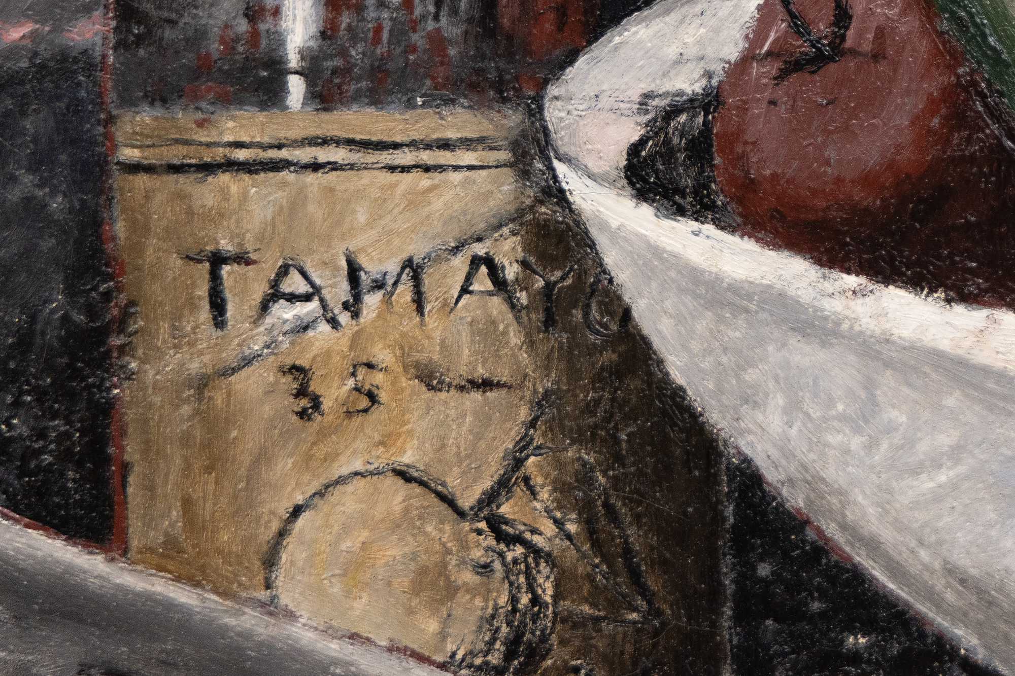 RUFINO TAMAYO - Naturaleza Muerta <div>In the mid-1920s, Rufino Tamayo embarked on the crucial development phase as a sophisticated, contemporary colorist. In New York, he encountered the groundbreaking works of Picasso, Braque, and Giorgio de Chirico, along with the enduring impact of Cubism. Exploring painterly and plastic values through subjects sourced from street scenes, popular culture, and the fabric of daily life, his unique approach to color and form began to take shape. It was a pivotal shift toward cosmopolitan aesthetics, setting him apart from the nationalist fervor championed by the politically charged narratives of the Mexican Muralist movement. By focusing on the vitality of popular culture, he captured the essential Mexican identity that prioritized universal artistic values over explicit social and political commentary. The approach underscored his commitment to redefining Mexican art on the global stage and highlighted his innovative contributions to the modernist dialogue. </div><br><br><div> </div><br><br><div>Like Cézanne, Tamayo elevated the still life genre to some of its most beautifully simple expressions. Yet high sophistication underlies the ease with which Tamayo melds vibrant Mexican motifs with the avant-garde influences of the School of Paris. As "Naturaleza Muerta" of 1935 reveals, Tamayo refused to lapse into the mere decoration that often characterizes the contemporary School of Paris art with which his work draws comparisons. Instead, his arrangement of watermelons, bottles, a coffee pot, and sundry items staged within a sobering, earthbound tonality and indeterminant, shallow space recalls Tamayo's early interest in Surrealism. An overlayed square matrix underscores the contrast between the organic subjects of the painting and the abstract, intellectualized structure imposed upon them, deepening the interpretation of the artist's exploration of visual perception and representation. In this way, the grid serves to navigate between the visible world and the underlying structures that inform our understanding of it, inviting viewers to consider the interplay between reality and abstraction, sensation and analysis.</div>