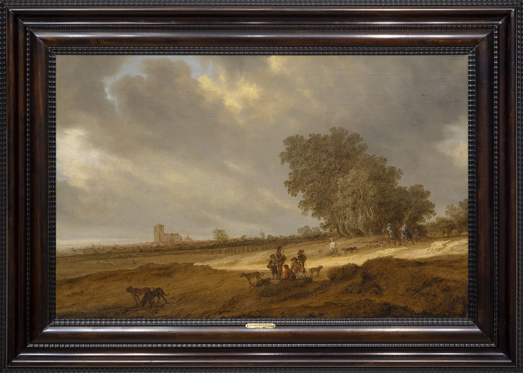 SALOMON VAN RUYSDAEL - A Dune Landscape with Figures Resting and a Couple on Horseback, a View of Nijmegen Cathedral Beyond - oil on canvas - 26 1/2 x 41 1/2 in.