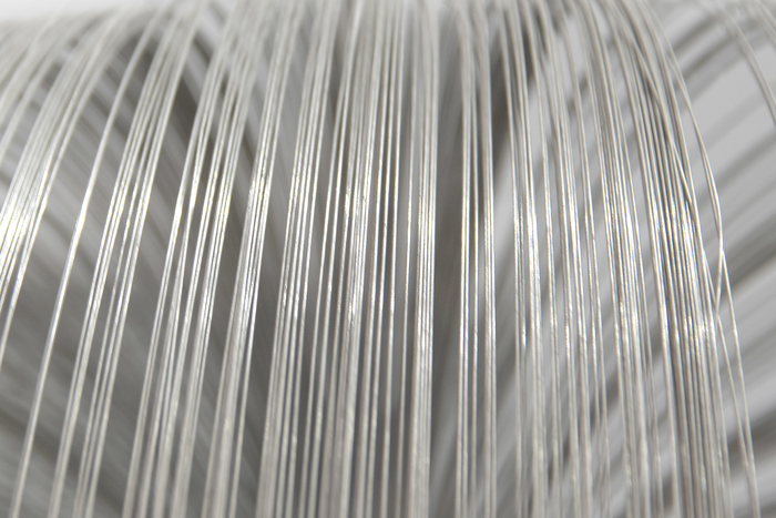 HARRY BERTOIA - Untitled (Suspended Willow) Harry Bertoia’s Willow sculpture resonates as an expression of grace and delicacy; qualities that bely the usual associations we have with the intrinsic properties of the alloy of which it is made. This suspended version – the rare version of Willow - seems to have a self-aware presence; one that delights in that contrast of properties. Yet it invites nothing more than existential pleasure in the viewing of it. Think of Willow as a boldly articulated version of Calder if the latter master had a more organic or corporeal evocation in mind. Suspended, it commands its area yet respects its spatial relationship to its surround. Light, form, space – these are conceptual tools of the sculptor. But who else would think to use reflective material more readily associated with inflexibility and tensor strength to create a bouquet of cascading strands of stainless steel, suspended in space, flora-like and so gracefully beautiful?