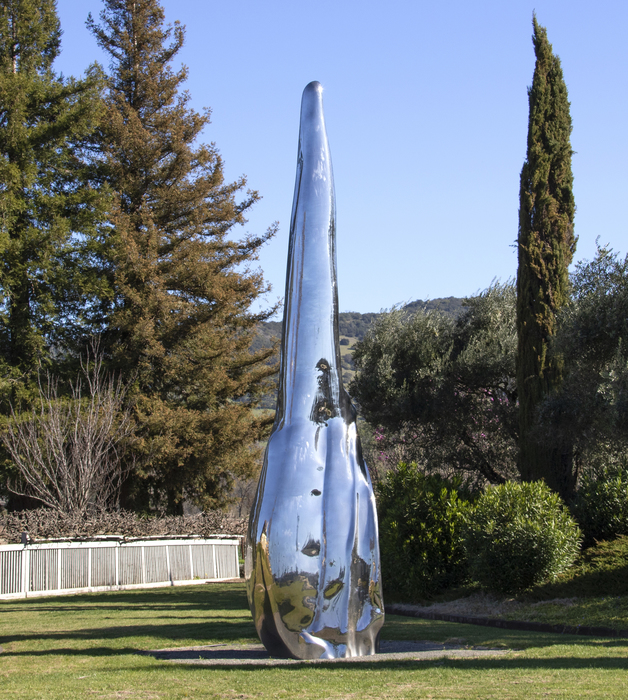 Not Vital - Tongue "Tongue" (2008) is a contemporary take on biomorphic abstraction, which was first popularized in the first quarter of the 20th century by artists including Jean Arp and Joan Miro. The work measures an astounding 26 feet tall and utilizes Not Vital's signature highly finished and highly polished aesthetic sense to great effect. The sculpture seems to absorb its surroundings with its mirror-like surface, an apparent contradiction because it is a modern material.
<br>
<br>The cow tongue is a particular subject of interest for the artist, as he was licked by one once, an experience he describes as alien and shocking. Tongues are tools for tasting, a sensory experience, much like the experience of seeing a sculpture.
<br>
<br>"Tongue" has remained in the same private collection since the creation of the work. Another example of "Tongue" (which was created in an edition of 3) was shown to great acclaim at the Yorkshire Sculpture Park in the United Kingdom, 21 May 2016 - 1 January 2017. Non Vital is represented in numerous museum collections including, the Bibliothèque Nationale, Paris, France, The Museum of Modern Art (MoMA), New York, The Solomon R. Guggenheim Museum, New York, USA.