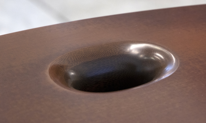 MARC NEWSON - Micarta Table Marc Newson is widely recognized as one of the most influential designers of our time. His subjects range from seemingly ordinary objects such as bicycles to groundbreaking designs in furniture and airplanes. The Philadelphia Museum of Art's 2013-2014 exhibition "Marc Newson: At Home" exposed a new American audience to Newson's futuristic aesthetic in a traditional museum setting.
<br>
<br>"Micarta Table" (2007) uses contemporary materials, including plastic composites, to create the illusion of a traditional wood veneer surface. This blending of old and new is a hallmark of Newson's work. Examples of Newson's work can be found in museum collections worldwide, including the Museum of Modern Art, New York, The San Francisco Museum of Modern Art, and the Cooper Hewitt Smithsonian Design Museum, New York City.