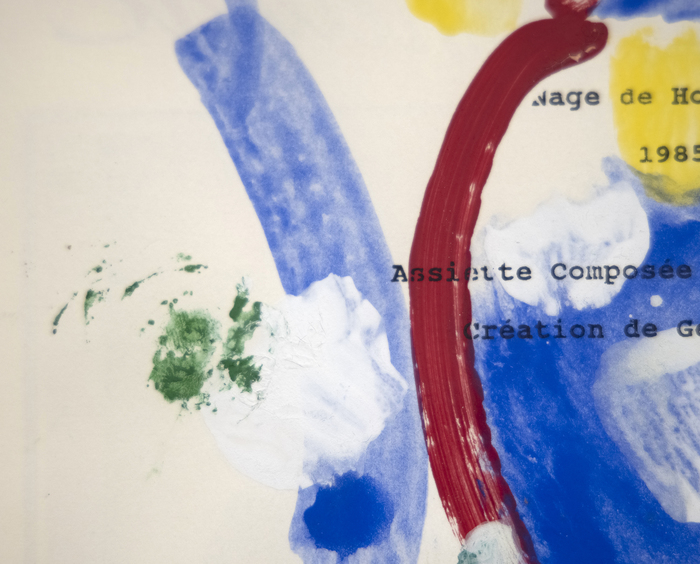 HELEN FRANKENTHALER - Menu from Hans Namuth's Dinner Party Helen Frankenthaler was one of the most important members of the Abstract Expressionists and pioneer within the Color Field movement. Her facility to control paint to stain unprimed canvas allowed her to explore the possibilities of texture, color, and composition.
<br>
<br>Despite the free-flowing nature of her canvas, this small piece shows Frankenthaler’s skill with composition, showing a sense of intimacy and immediacy through its repurposing of a menu. The work does not completely obscure the text but rather incorporates and interacts with it from the field of blue to the meditative red circle to the dabs of white, green, and yellow. Hans Namuth was a German photographer who captured Jackson Pollock and other Abstract Expressionist painters. A photograph by Namuth of Frankenthaler is in the National Portrait Gallery (Washington, DC).